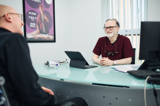Dr Kunnure performing a hair restoration procedure